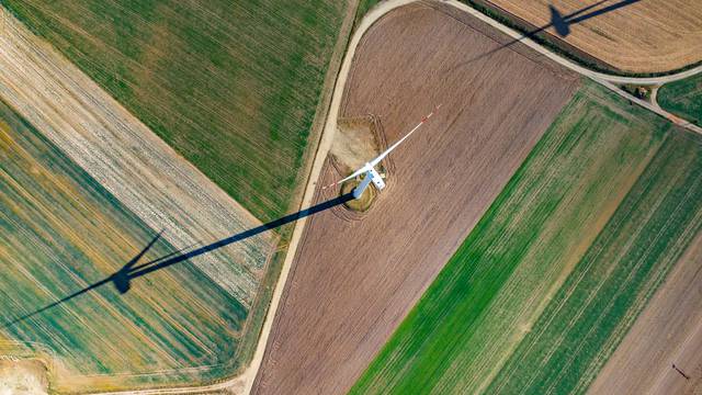 Aerial,View,On,The,Windmill,And,His,Long,Shadow,On