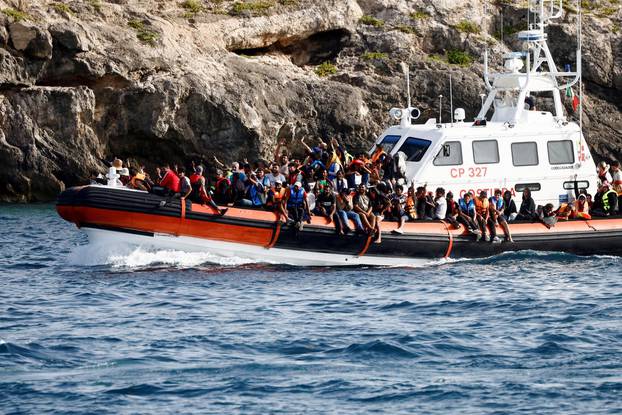 FILE PHOTO: Migrants in Lampedusa