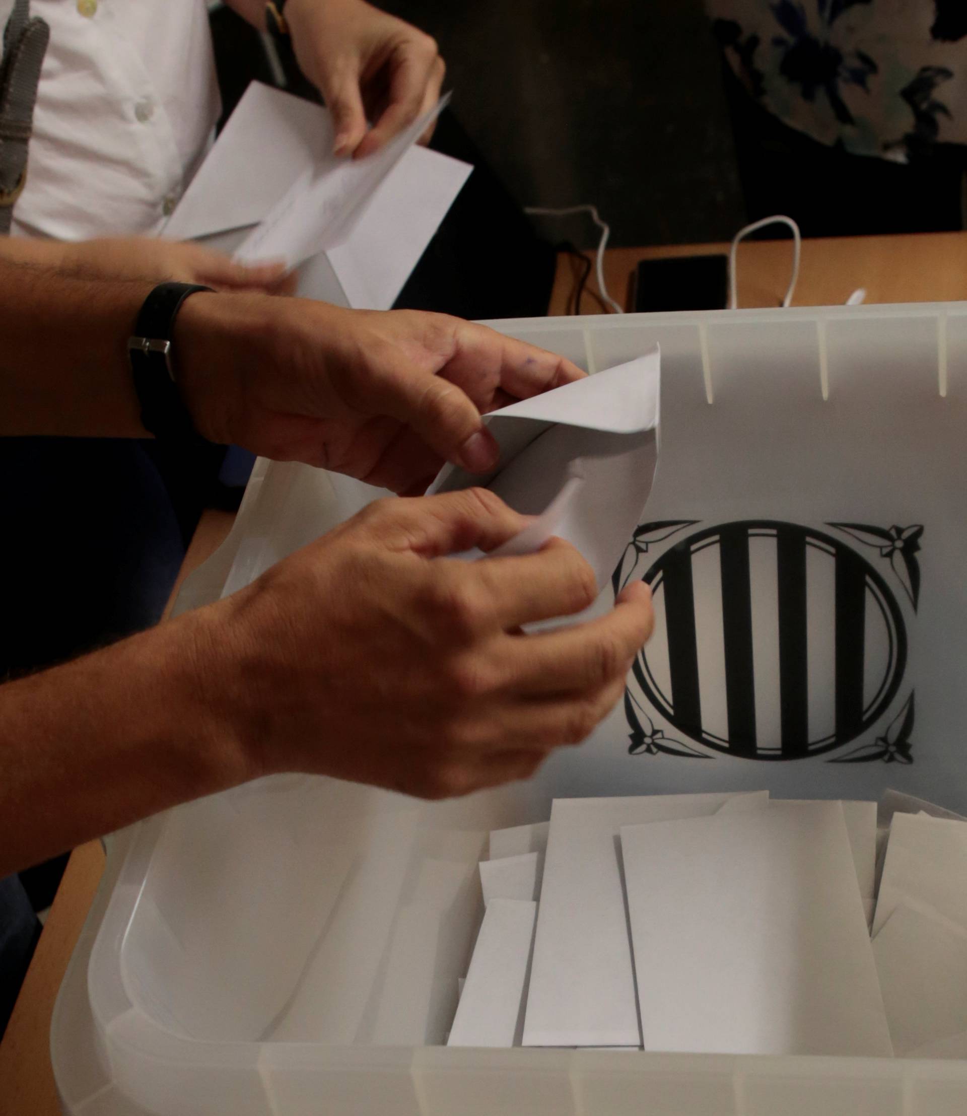 Ballots are counted after the banned independence referendum in Barcelona
