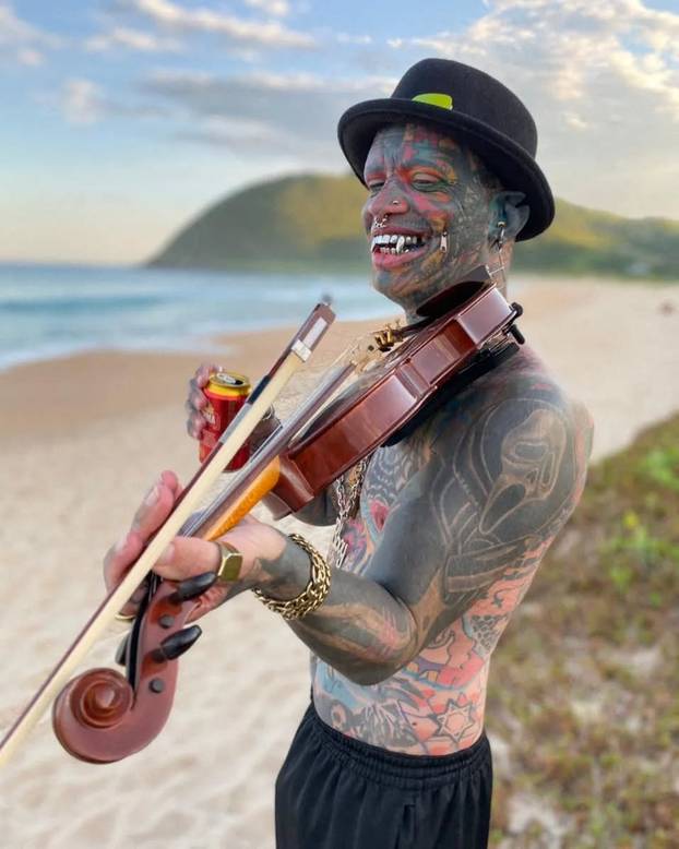 EXCLUSIVE: 'Most modified man in the world' holds TOOTHBRUSH and sunglasses in stretched NOSTRILS after chopping off fingers