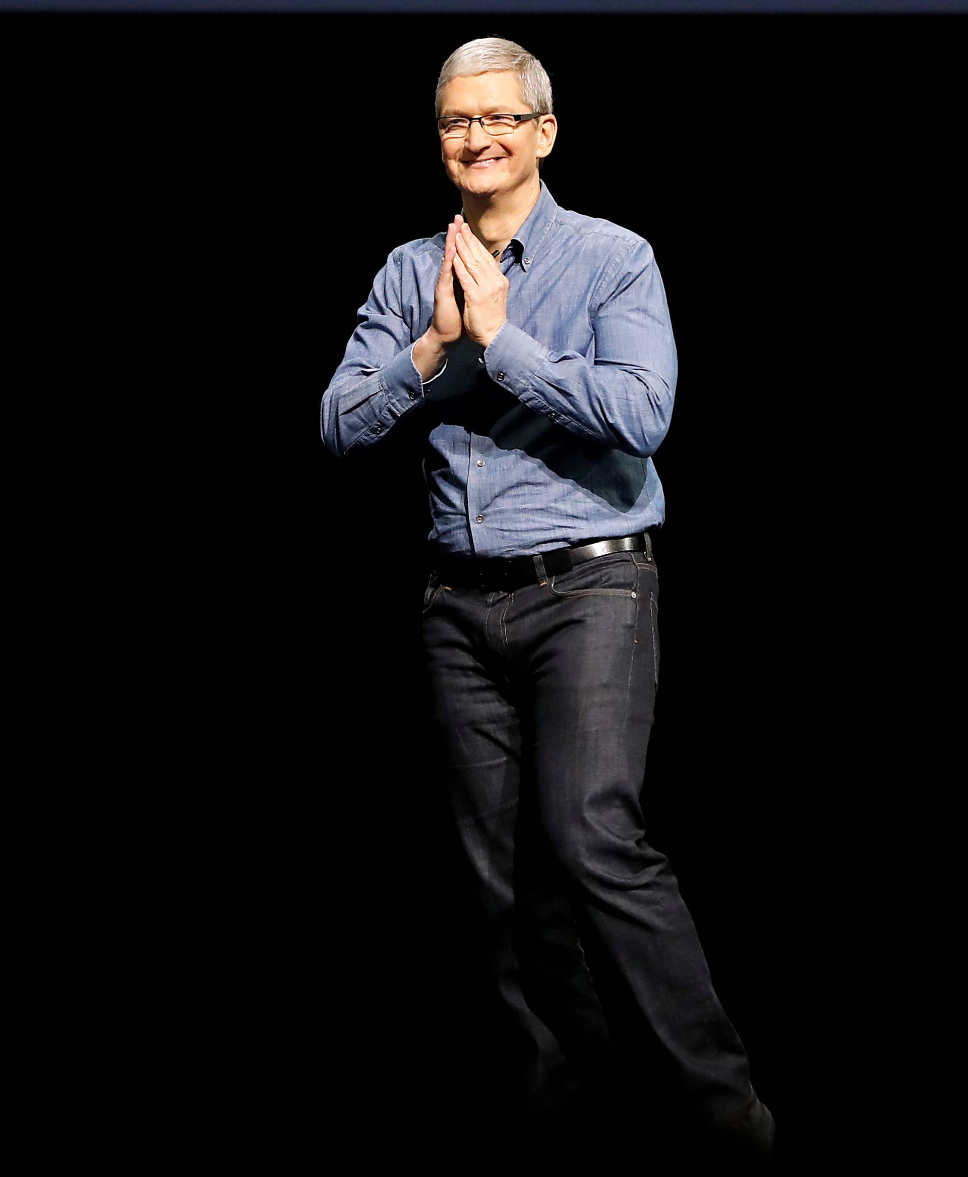 Apple Inc. CEO Tim Cook gestures to the audience as he closes the company's World Wide Developers Conference keynote in San Francisco