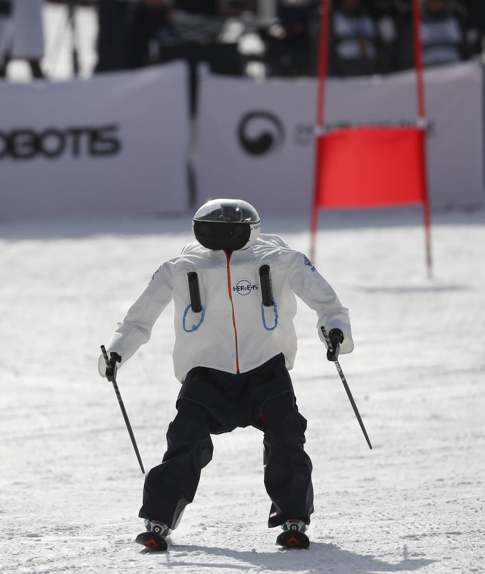 A robot takes part in the Ski Robot Challenge at a ski resort in Hoenseong