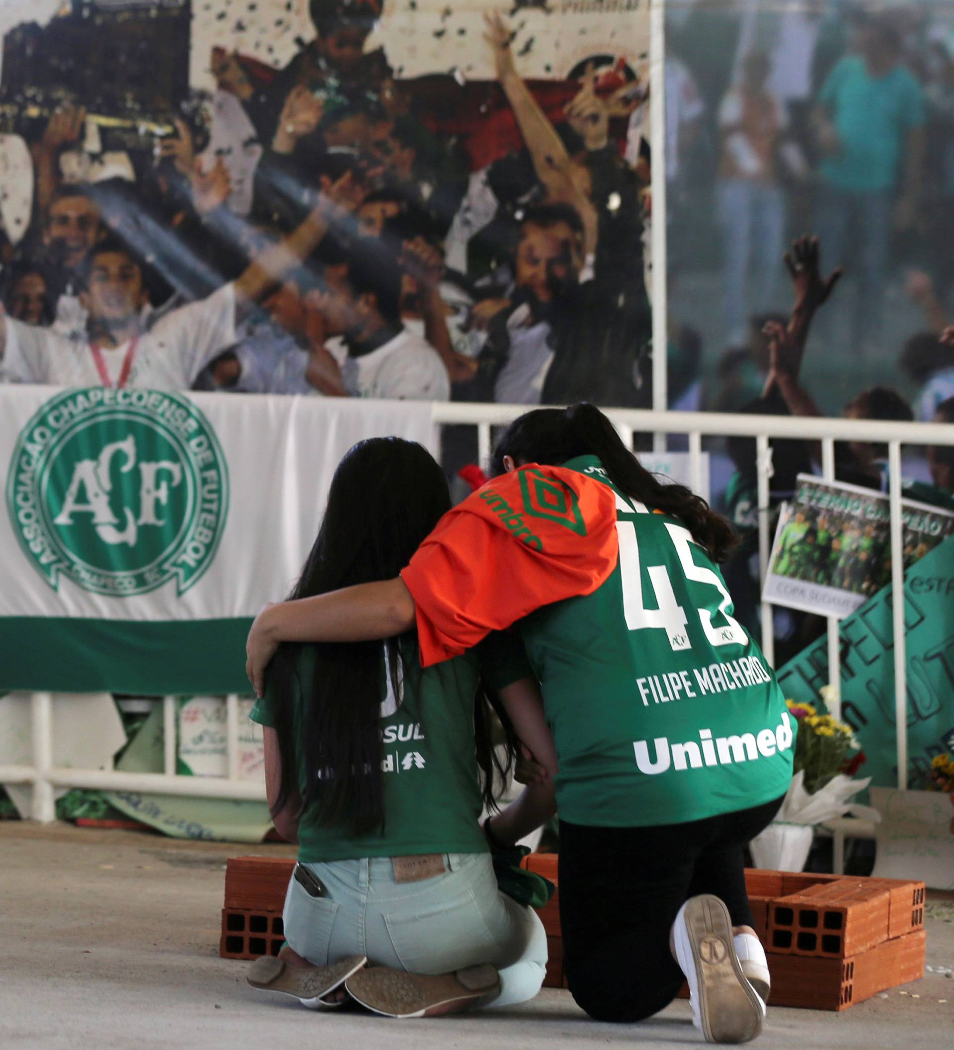 Fans of Chapecoense soccer team pay tribute to Chapecoense's players at the Arena Conda stadium in Chapeco