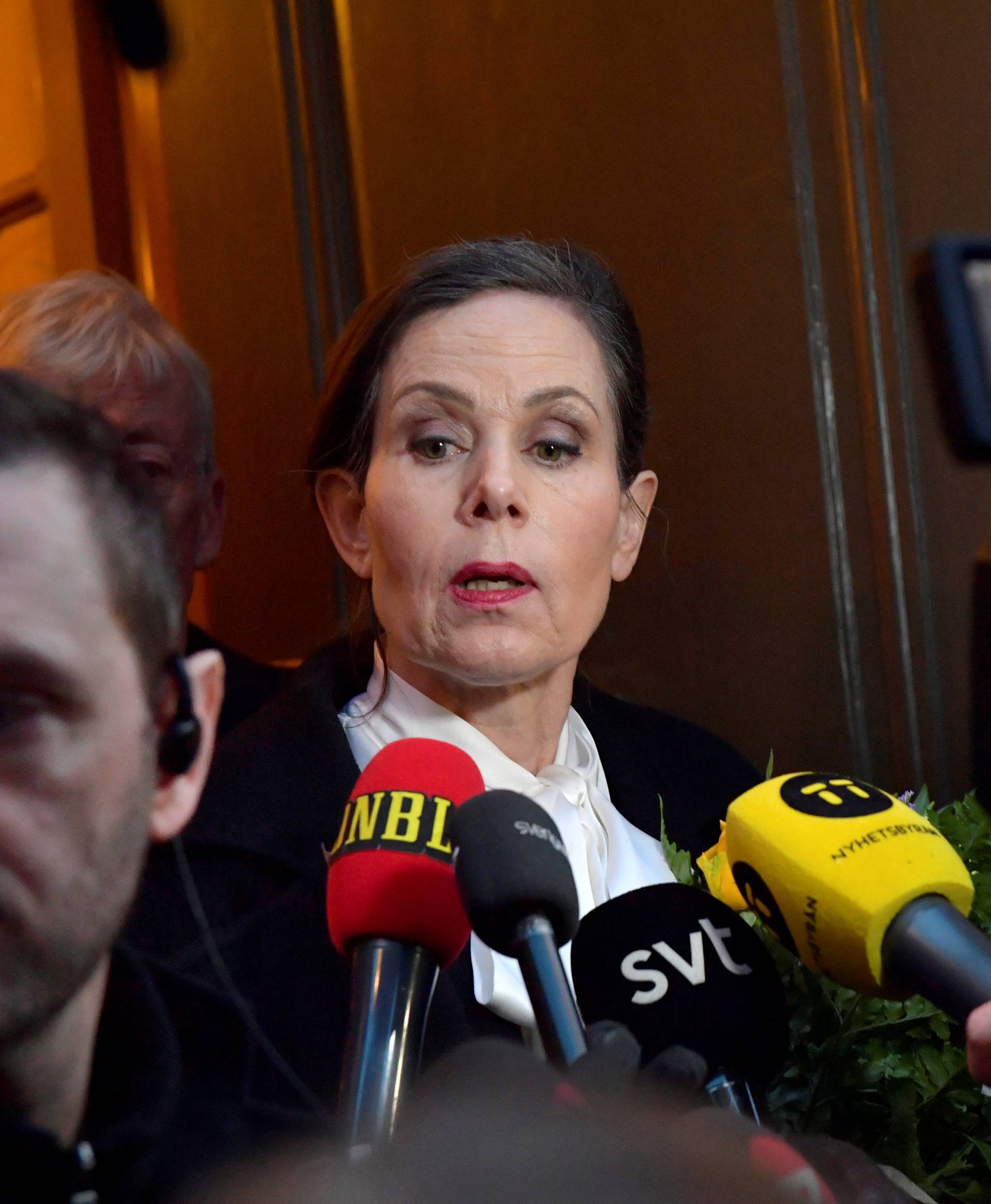 The Swedish Academy's Permanent Secretary Sara Danius talks to the media as she leaves after a  meeting at the Swedish Academy in Stockholm
