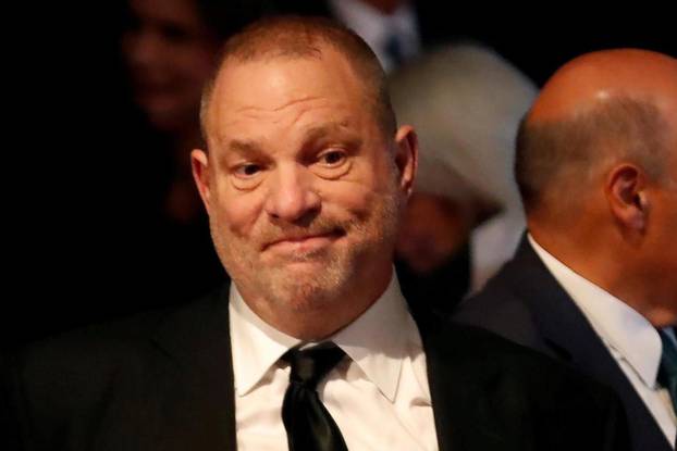 FILE PHOTO: Producer Weinstein stands in the audience ahead of the first presidential debate between U.S. presidential nominee Donald trump and U.S. presidential nominee Clinton in Hempstead