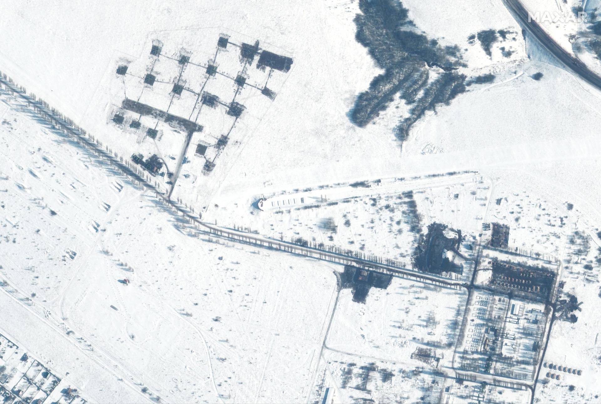 A satellite image shows an overview of a helicopter unit and troops in Belgorod