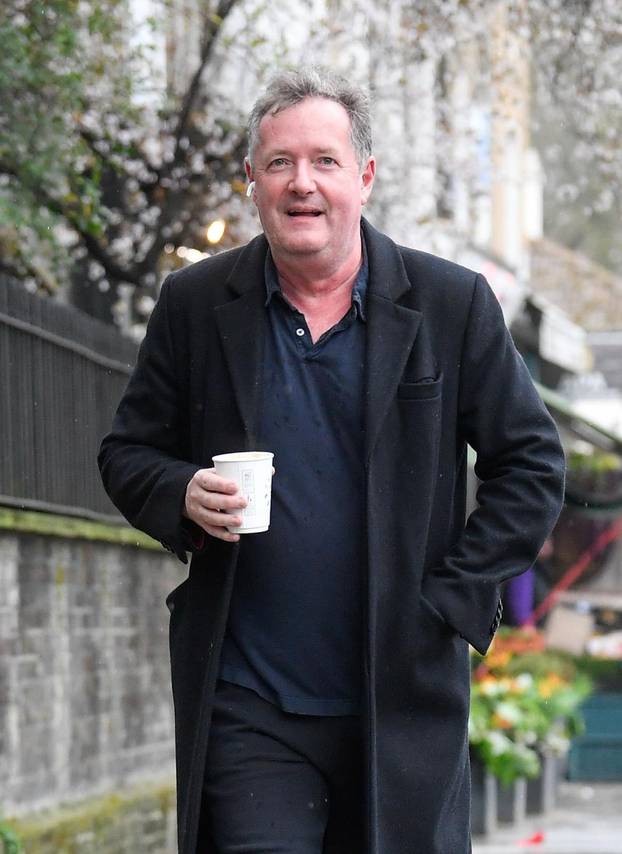 Piers Morgan walks near his house in London