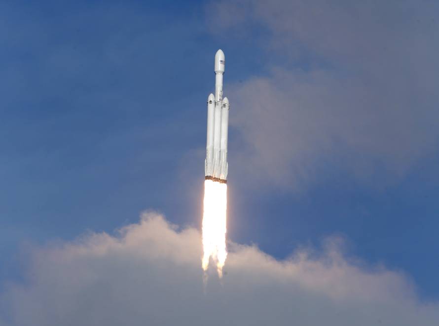 A SpaceX Falcon Heavy rocket lifts off from the Kennedy Space Center in Cape Canaveral