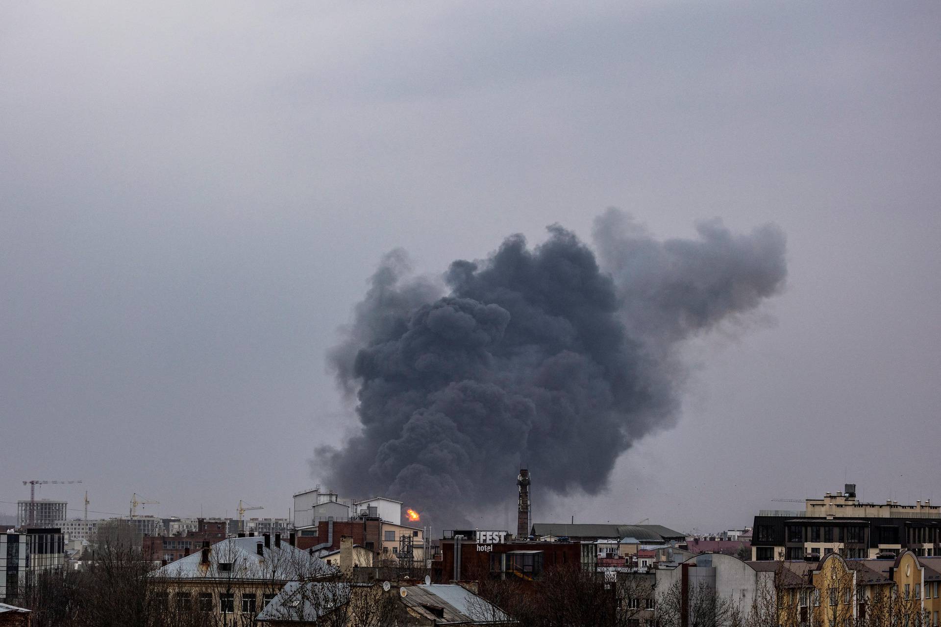 Smoke rises after an airstrike in Lviv