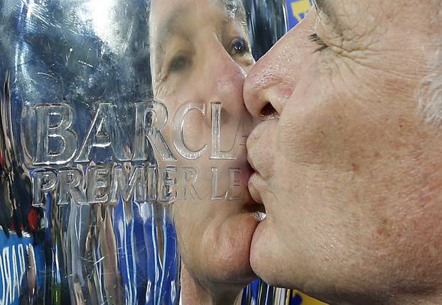 Leicester City manager Claudio Ranieri with the trophy as he celebrates winning the Barclays Premier League