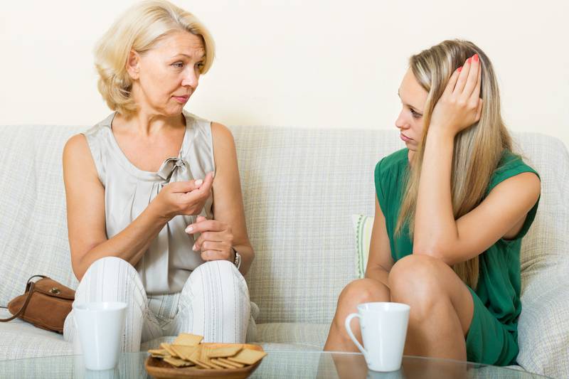  mature woman and  daughter  talking  