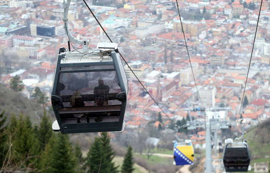 The Trebevic cable car is seen above the city of Sarajevo during a test drive following the restoration of the line after 26 years