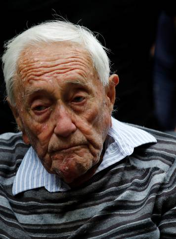 David Goodall, 104, arrives to hold a news conference a day before he intends to take his own life in assisted suicide, in Basel