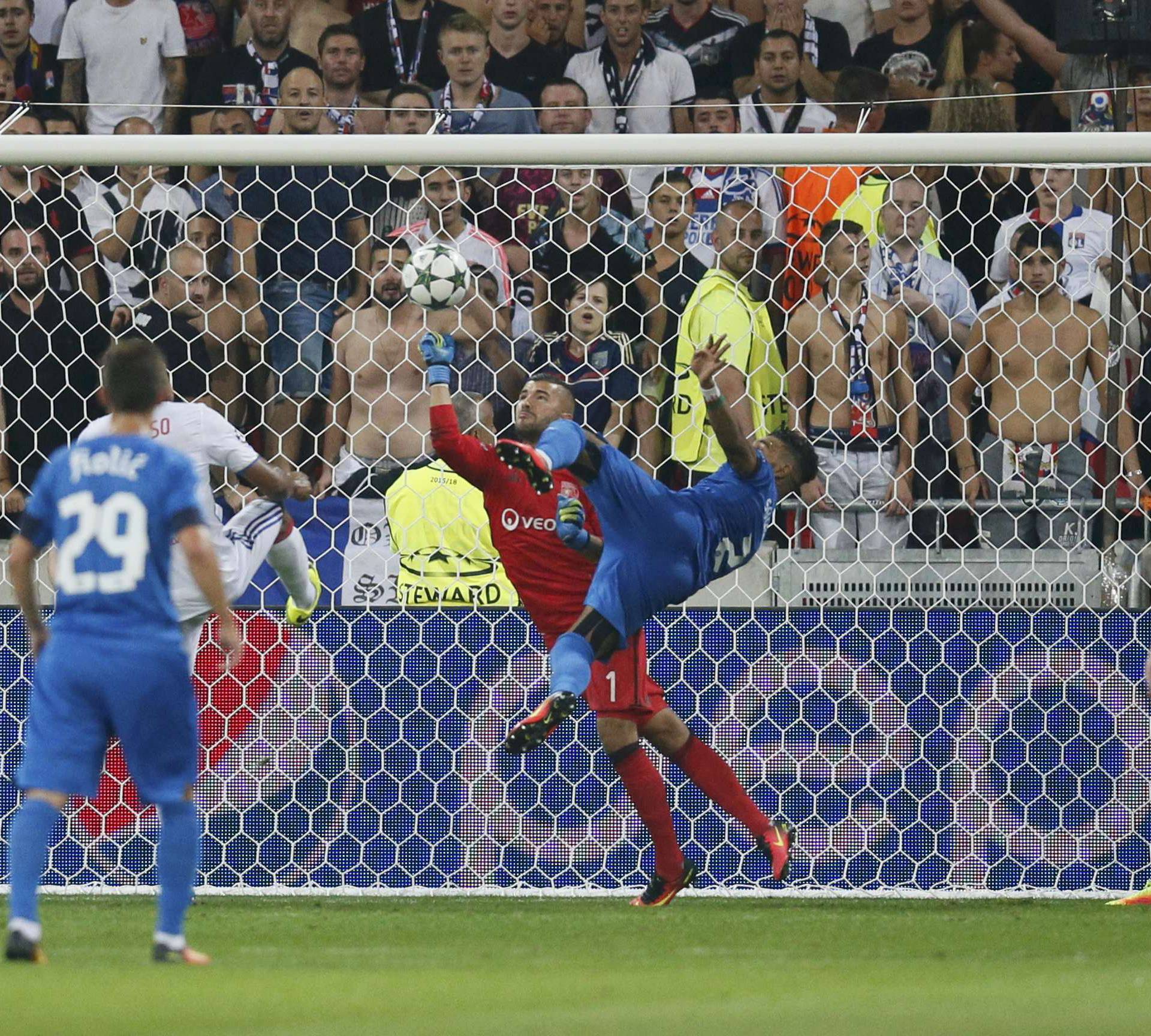 Olympique Lyon's Rachid Ghezzal in action with Dinamo Zagreb's El Arabi Hila Soudani