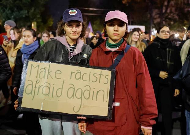People attend a protest against Freedom Party after general elections in Vienna
