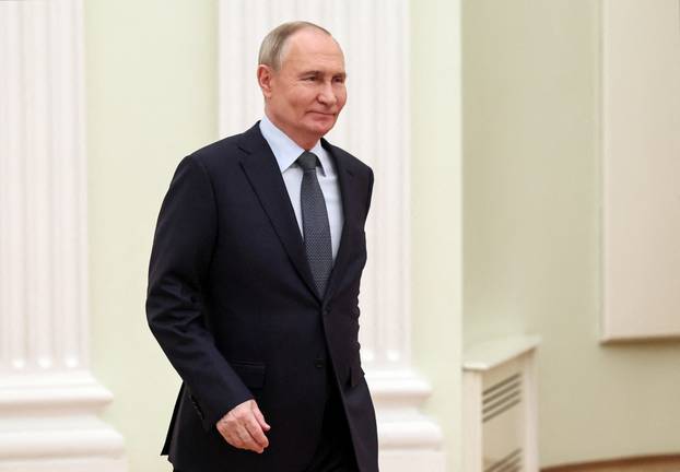 Russian President Putin meets Indian Defence Minister Singh in Moscow