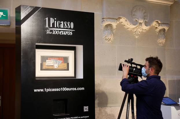 Charity raffle draw designates the winner of a Picasso oil painting for 100 euros at Christie