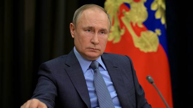 Russian President Vladimir Putin attends a meeting in Sochi