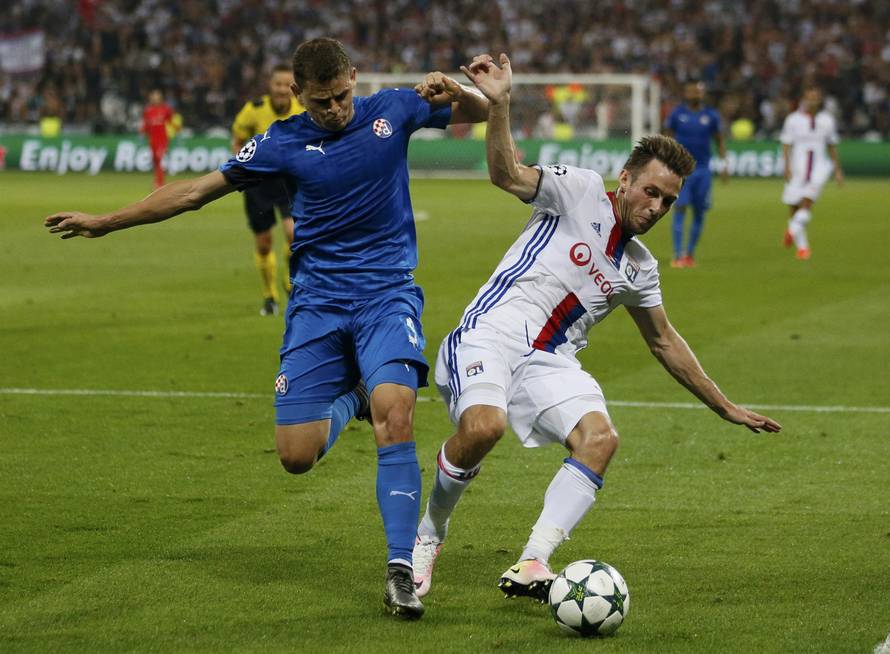 Dinamo Zagreb's Jonas in action with Olympique Lyon's Nicolas Nkoulou