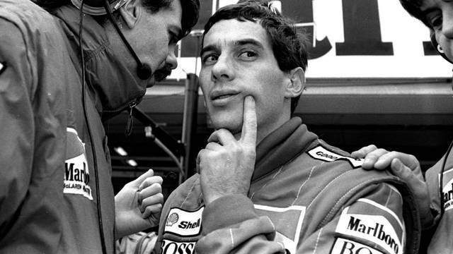 FILE PHOTO: BRAZILIAN RACING DRIVER SENNA TALKS TO MCLAREN TEAM MEMBER DURING FINAL PRACTICE SESSION FOR JAPANESE ...