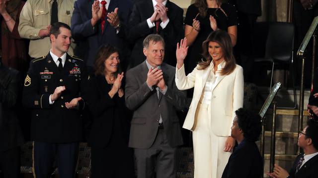 Melania Trump waves prior to President Trump's State of the Union address in Washington