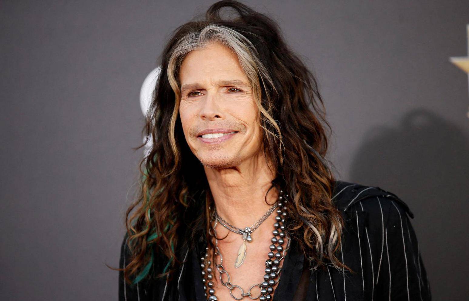 FILE PHOTO: Singer Steven Tyler of Aerosmith arrives at the Hollywood Film Awards in Hollywood