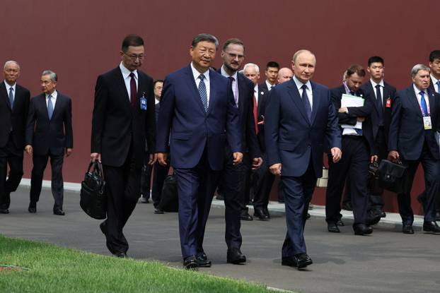 Russian President Vladimir Putin meets with Chinese President Xi Jinping in Beijing