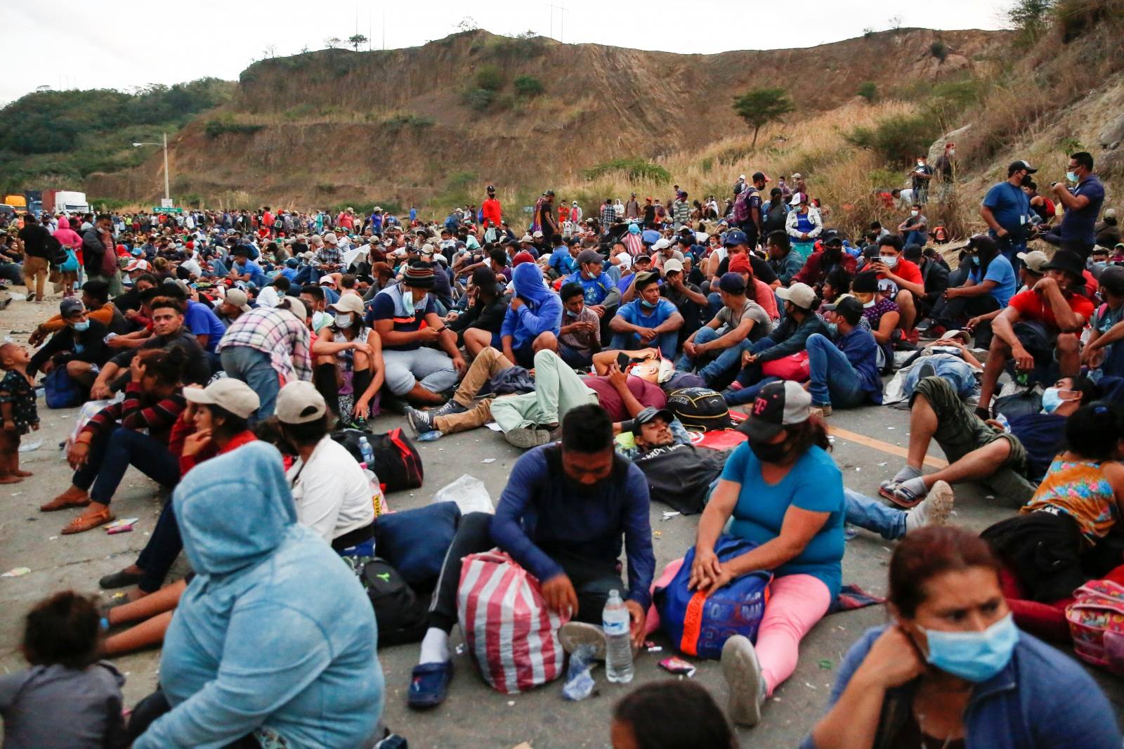 Hondurans take part in a new caravan of migrants, set to head to the United States, in Vado Hondo