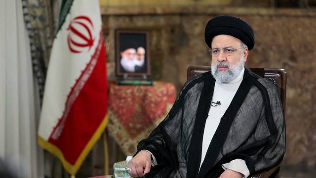 FILE PHOTO: Iranian President Ebrahim Raisi attends a TV interview in Tehran