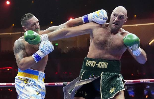 Tyson Fury and Oleksandr Usyk file photo