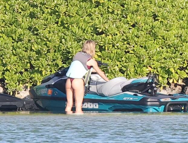 *PREMIUM-EXCLUSIVE* Good Genes! Sydney Sweeney shows off her toned bikini body while jet skiing with Scooter Braun in the Florida Keys!