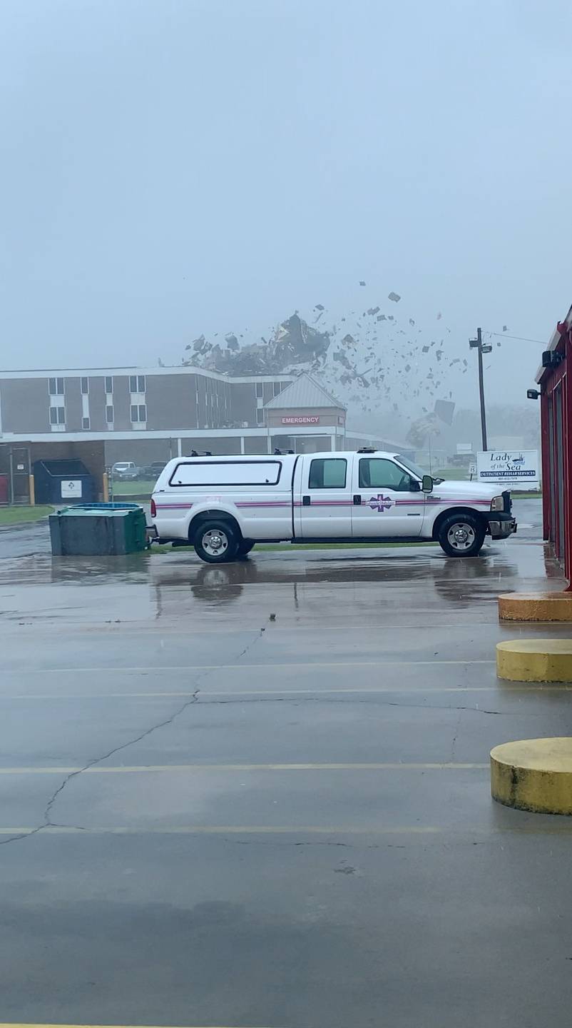 Winds and rain from Hurricane Ida blows off the roof of the Lady Of The Sea hospital building in Galliano