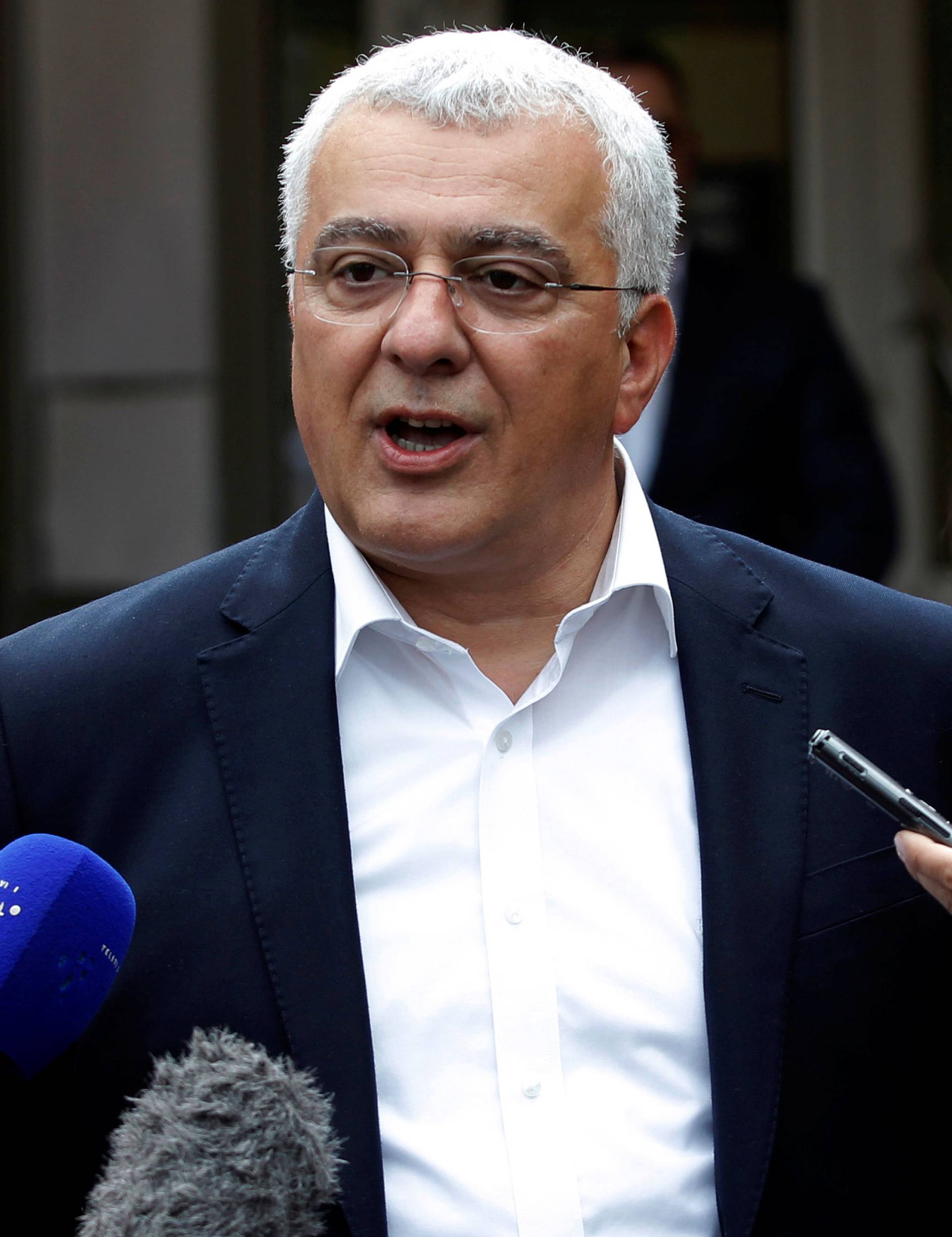 Andrija Mandic, leader of opposition Democratic Front alliance, speaks to the media after voting in Podgorica