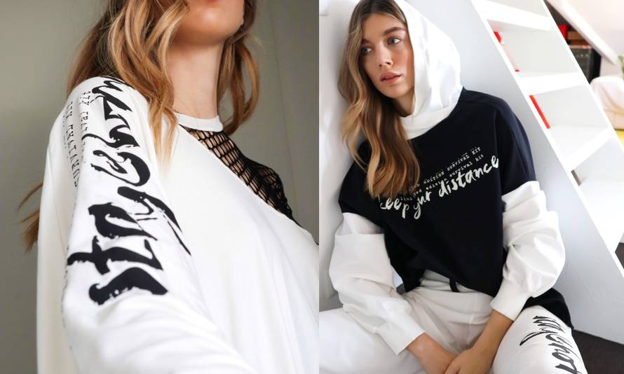 Outfit s porukom: Crno-bijele "Keep your distance" trenirke