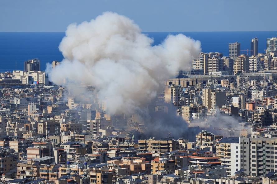 Smoke billows after an Israeli strike on Beirut's southern suburbs