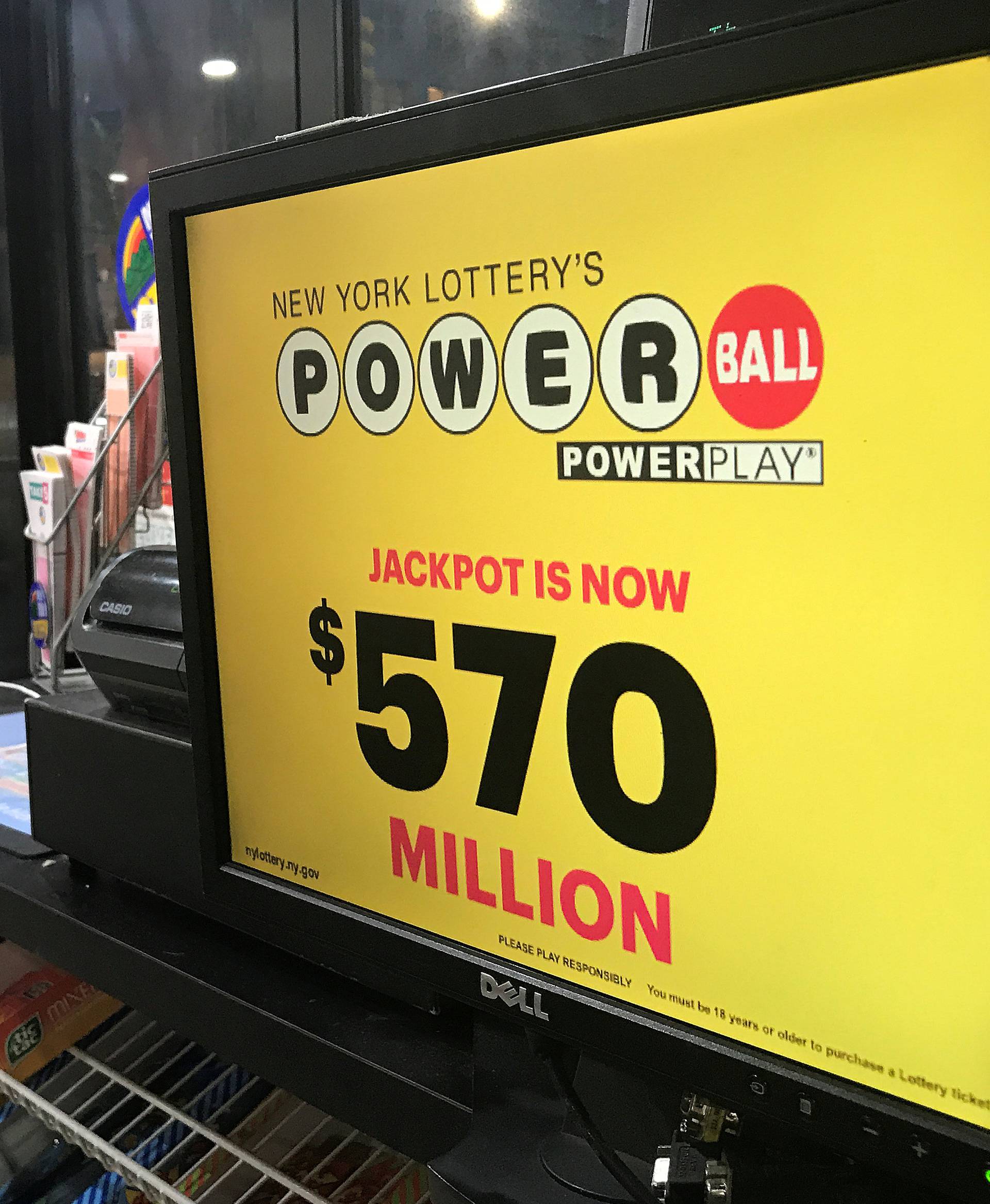 A Powerball sign is pictured in a store in New York City