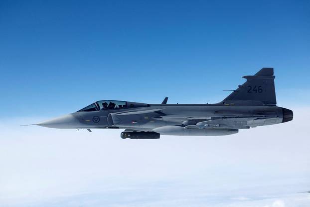 FILE PHOTO: A Swedish Air Force Saab JAS 39 Gripen fighter jet flies during a media day