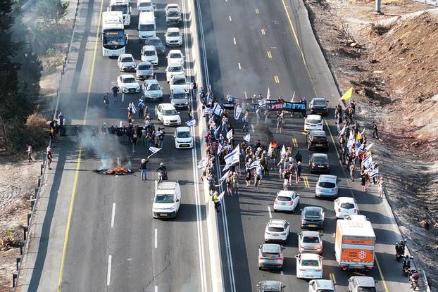 People block Israel's main highway connecting Jerusalem and Tel Aviv near Latrun