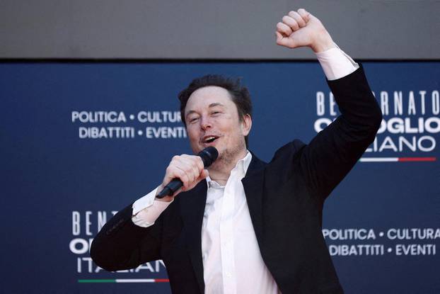 FILE PHOTO: Elon Musk attends Italy's PM Meloni's right-wing party's political festival Atreju, in Rome