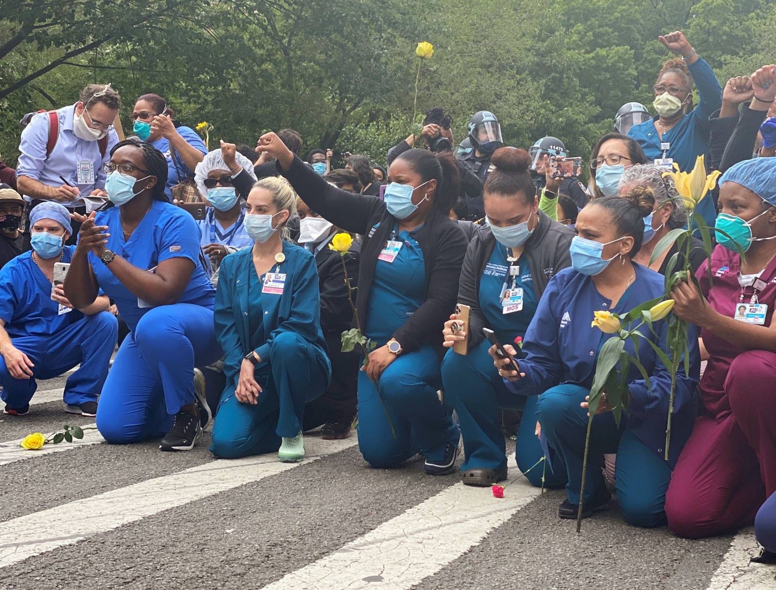 Healthcare workers join a protest in New York City