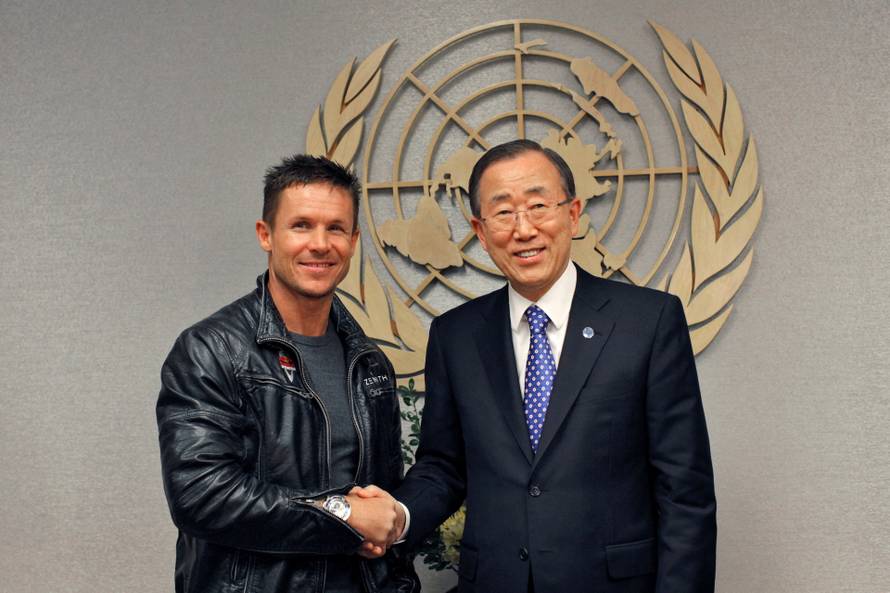 FILE PHOTO: Pilot Baumgartner of Austria shakes hands with U.N. Secretary-General Ban Ki-moon during a photo opportunity at UN headquarters in New York
