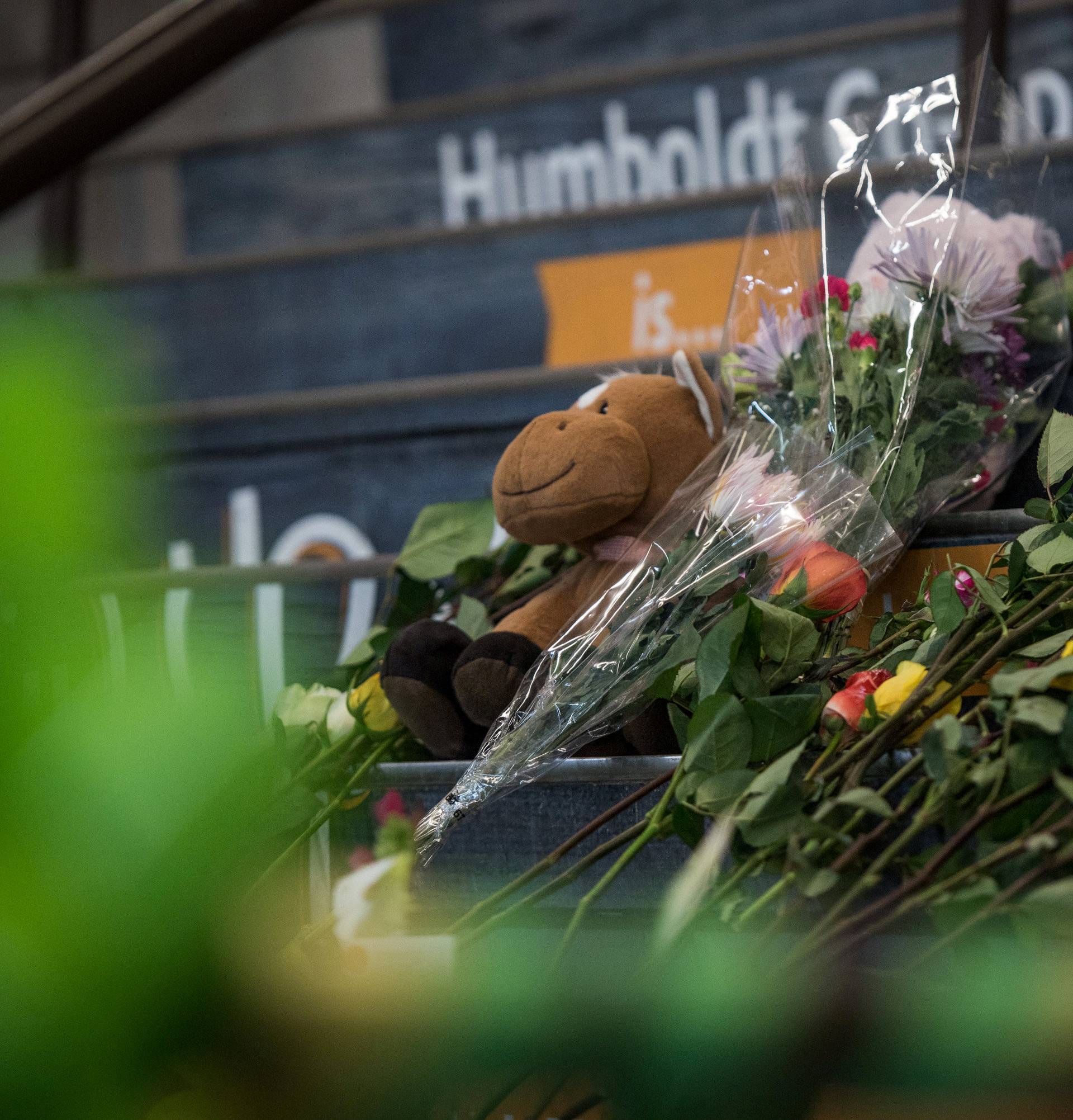 Community members leave notes and flowers at a memorial for the Humboldt Broncos team leading into the Elgar Petersen Arena in Humboldt Saskatchewan