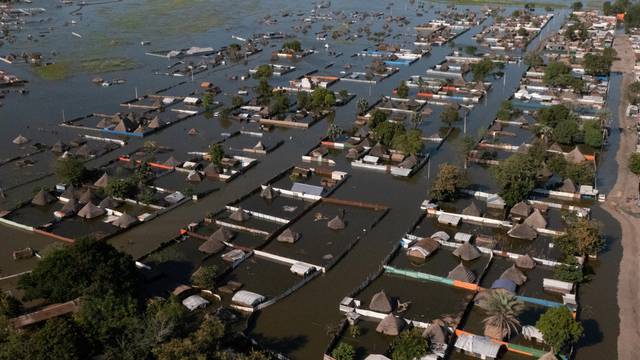 An aerial view shows houses submerged in flood waters in Bentiu, in Unity State