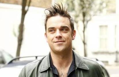 Robbie Williams želi imati troje djece sa Aydom Field