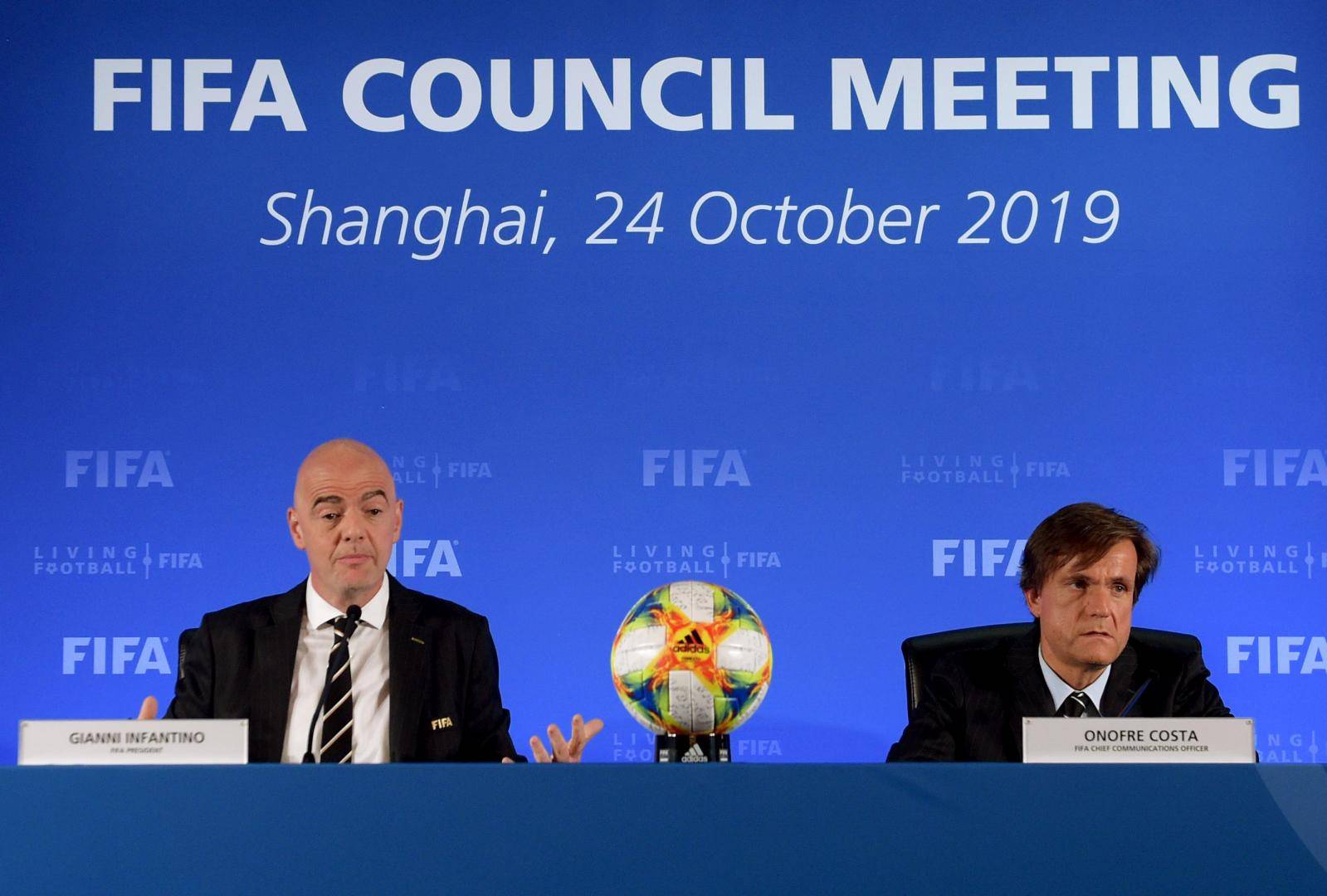 FIFA President Gianni Infantino and Chief Communications Officer Onofre Costa attend the association's council meeting in Shanghai