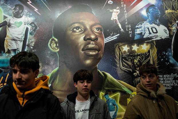 People mourn the death of Brazilian soccer legend Pele, in New York