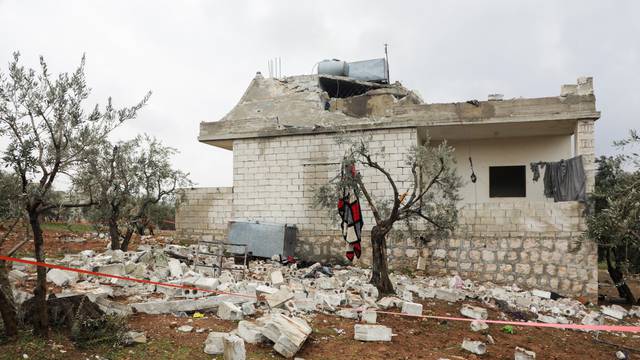 Debris from a building destroyed in the aftermath of a counter-terrorism mission conducted by the U.S. Special Operations Forces is seen in Atmeh