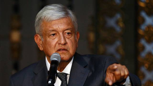 Mexico's president-elect Andres Manuel Lopez Obrador addresses the media after a private meeting with Mexico's President Enrique Pena Nieto at National Palace in Mexico City