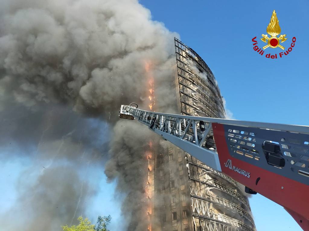 Fire rages through Milan residential tower block