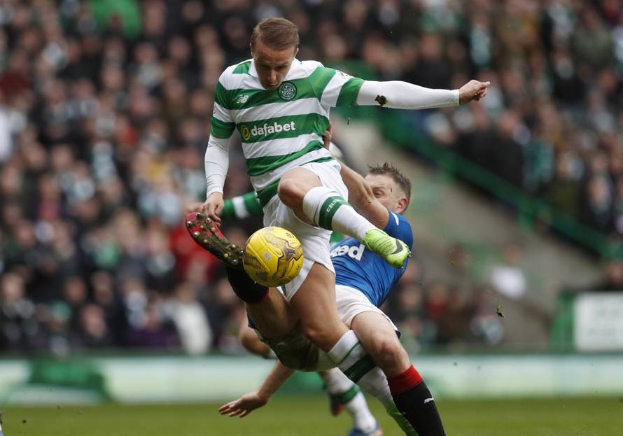 Rangers' Clint Hill in action with Celtic's Leigh Griffiths